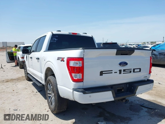 2023 Ford F-150 XL with VIN 1FTEW1CP5PKF42521, listed as a IAAI auction lot 42257062 with 30,758 mi miles and . Bid and sale history available at DreamBid. Image 3.