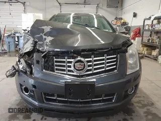 2013 Cadillac SRX Performance Collection with VIN 3GYFNHE37DS530908, listed as a IAAI auction lot 41662796 with 80,254 mi miles. Bid and sale history available at carsss.com. Image 13.