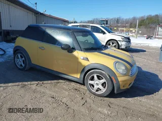 2008 MINI Hardtop with VIN WMWMF33568TT61894, listed as a IAAI auction lot 41351598 with 105,112 mi miles and . Bid and sale history available at DreamBid. Image 1.