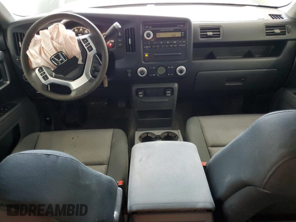 2007 Honda Ridgeline RTS z VIN 2HJYK16467H514031, wystawiony jako Copart lot #57571865 z przebiegiem 298 895 mil mil oraz Szkoda całkowita • Salvage title. Historia ofert i sprzedaży dostępna na DreamBid. Obrazek 8.