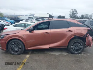 2023 Lexus RX 500h F Sport Performance with VIN 2T2BCMEA2PC001705, listed as a IAAI auction lot 41765718 with 32,391 mi miles and . Bid and sale history available at DreamBid. Image 14.