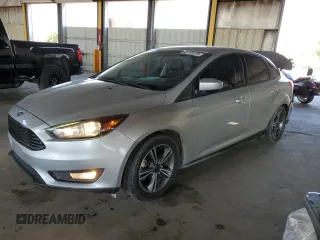 2018 Ford Focus SE с VIN 1FADP3FE6JL223702, выставлен на аукционе Copart как лот 62712075 с пробегом 75 805 миль миль и Списание • Salvage title. История ставок и продаж доступна на DreamBid. Изображение 1.