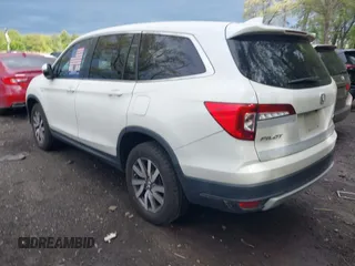 2019 Honda Pilot EX z VIN 5FNYF6H31KB086152, wystawiony jako IAAI lot #42204703 z przebiegiem 99 425 mil mil oraz . Historia ofert i sprzedaży dostępna na DreamBid. Obrazek 14.