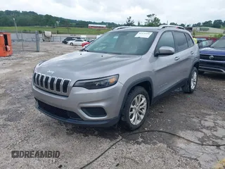 2020 Jeep Cherokee Latitude with VIN 1C4PJLCBXLD637338, listed as a IAAI auction lot 42471556 with 69,191 mi miles and . Bid and sale history available at DreamBid. Image 2.
