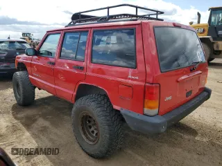 2000 Jeep Cherokee with VIN 1J4FF48S0YL113246, listed as a Copart auction lot 51861455 with 180,965 mi miles and Clean title. Bid and sale history available at DreamBid. Image 2.