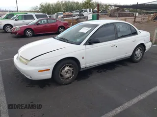 1997 Saturn SL with VIN 1G8ZK5275VZ254745, listed as a IAAI auction lot 41686816 with 135,074 mi miles and . Bid and sale history available at DreamBid. Image 2.