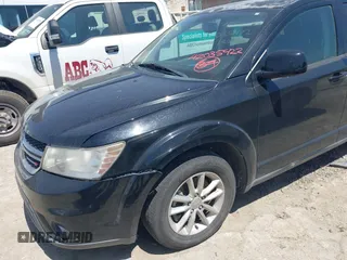 2015 Dodge Journey SXT with VIN 3C4PDCBB0FT708876, listed as a IAAI auction lot 42035422 with 157,669 mi miles. Bid and sale history available at carsss.com. Image 6.