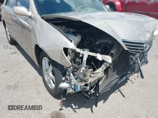 2006 Toyota Camry STD z VIN 4T1BE30KX6U658158, wystawiony jako IAAI lot #42394262 z przebiegiem 102 830 mil mil oraz . Historia ofert i sprzedaży dostępna na DreamBid. Obrazek 17.