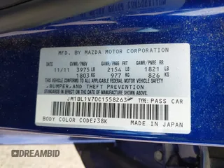 2012 Mazda Mazda3 i Touring with VIN JM1BL1V70C1558263, listed as a IAAI auction lot 41889154 with 31,161 mi miles. Bid and sale history available at carsss.com. Image 9.