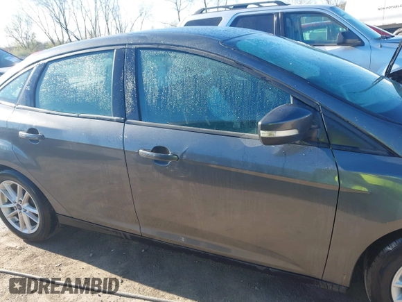 2016 Ford Focus SE with VIN 1FADP3F26GL233564, listed as a IAAI auction lot 42083597 with 153,404 mi miles and . Bid and sale history available at DreamBid. Image 14.