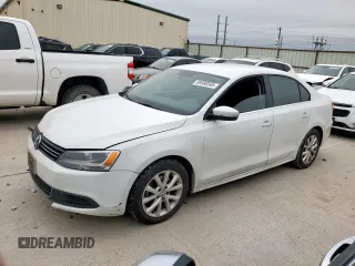2014 Volkswagen Jetta SE с VIN 3VWD17AJXEM336030, выставлен на аукционе Copart как лот 50580595 с пробегом 167 498 миль миль и Списание • Salvage title. История ставок и продаж доступна на DreamBid. Изображение 1.