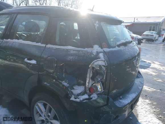 2013 MINI Cooper Countryman with VIN WMWZB3C53DWM08700, listed as a IAAI auction lot 41402093 with 71,109 mi miles. Bid and sale history available at carsss.com. Image 6.