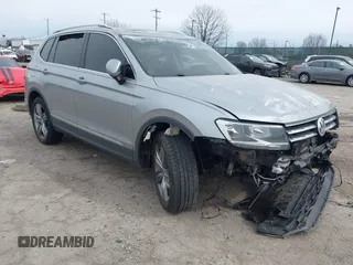 2020 Volkswagen Tiguan SE with VIN 3VV2B7AX6LM026760, listed as a IAAI auction lot 41652292 with 63,925 mi miles and . Bid and sale history available at DreamBid. Image 1.