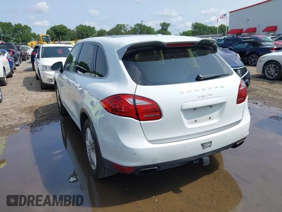 2014 Porsche Cayenne with VIN WP1AA2A21ELA94214, listed as a IAAI auction lot 42389334 with 114,276 mi miles and . Bid and sale history available at DreamBid. Image 3.
