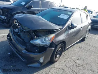 2015 Toyota Prius c One with VIN JTDKDTB33F1585004, listed as a IAAI auction lot 41950129 with 209,233 mi miles. Bid and sale history available at carsss.com. Image 17.