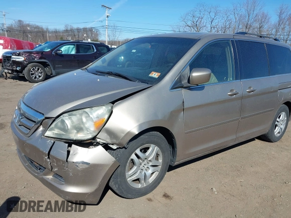 2006 Honda Odyssey EX-L z VIN 5FNRL38736B069969, wystawiony jako IAAI lot #41695311 z przebiegiem 196 218 mil mil oraz . Historia ofert i sprzedaży dostępna na DreamBid. Obrazek 19.