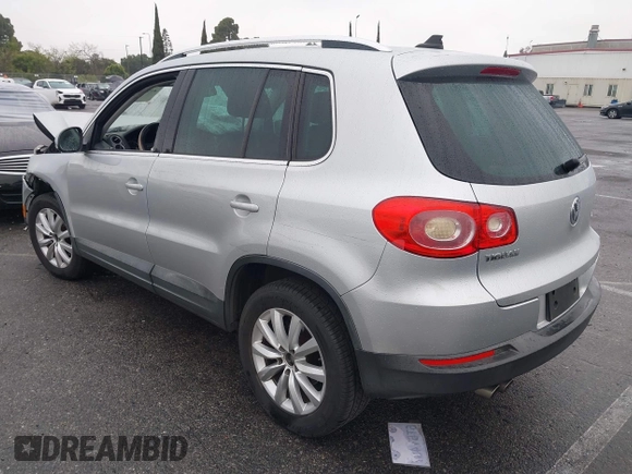 2011 Volkswagen Tiguan SEL w/Premium Navi with VIN WVGAV7AX7BW547613, listed as a IAAI auction lot 41916574 with 140,385 mi miles and . Bid and sale history available at DreamBid. Image 3.