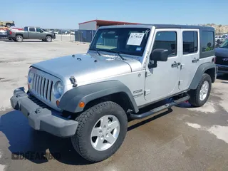 2010 Jeep Wrangler Unlimited Sport with VIN 1J4BA3H17AL211887, listed as a IAAI auction lot 41778324 with 185,626 mi miles. Bid and sale history available at carsss.com. Image 2.