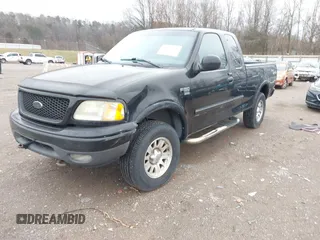 2002 Ford F-150 XL with VIN 1FTRX18W52NA84310, listed as a IAAI auction lot 41541794 with 325,315 mi miles and . Bid and sale history available at DreamBid. Image 2.