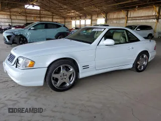 2001 Mercedes-Benz SL 500 with VIN WDBFA68F41F199859, listed as a Copart auction lot 66232235 with 34,102 mi miles and Clean title. Bid and sale history available at DreamBid. Image 1.