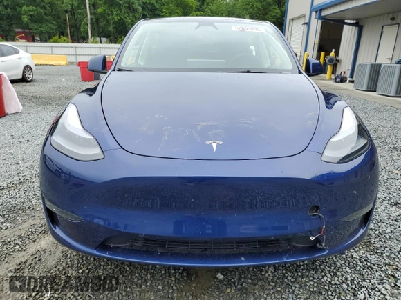 2024 Tesla Model Y Long Range with VIN 7SAYGDEE2RA246685, listed as a Copart auction lot 58699895 with 15,803 mi miles and Salvage title. Bid and sale history available at DreamBid. Image 5.