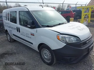 2019 Ram ProMaster City Cargo Tradesman z VIN ZFBHRFAB8K6N55261, wystawiony jako IAAI lot #42112543 z przebiegiem 116 999 mil mil oraz . Historia ofert i sprzedaży dostępna na DreamBid. Obrazek 1.