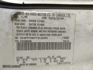 2000 Ford Crown Victoria with VIN 2FAFP73W7YX135395, listed as a IAAI auction lot 41439401 with 235,285 mi miles. Bid and sale history available at carsss.com. Image 9.