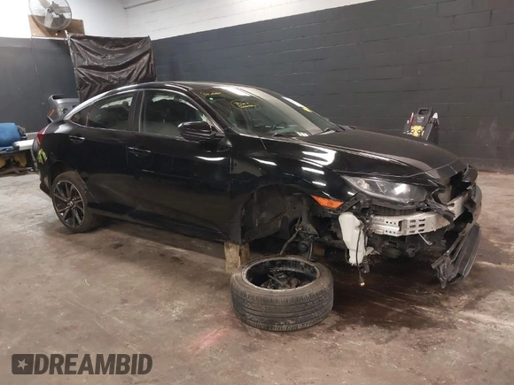 2019 Honda Civic Sport with VIN 2HGFC2F84KH590469, listed as a IAAI auction lot 41686757 with 79,602 mi miles and . Bid and sale history available at DreamBid. Image 1.