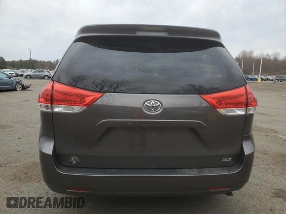 2014 Toyota Sienna XLE with VIN 5TDYK3DC1ES492724, listed as a Copart auction lot 51605245 with 112,079 mi miles and Salvage Title. Bid and sale history available at carsss.com. Image 6.