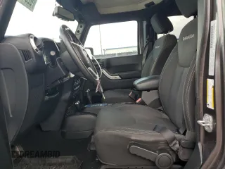 2016 Jeep Wrangler Unlimited 75th Anniversary with VIN 1C4BJWEG3GL216156, listed as a Copart auction lot 62611845 with 87,353 mi miles and Salvage title. Bid and sale history available at DreamBid. Image 7.
