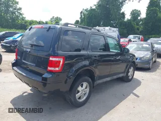 2011 Ford Escape XLT z VIN 1FMCU9D71BKA12061, wystawiony jako IAAI lot #42635447 z przebiegiem 195 433 mil mil oraz . Historia ofert i sprzedaży dostępna na DreamBid. Obrazek 4.