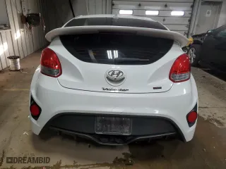 2014 Hyundai Veloster Turbo with VIN KMHTC6AE6EU208574, listed as a Copart auction lot 82103804 with 123,290 mi miles and Clean Title. Bid and sale history available at carsss.com. Image 6.