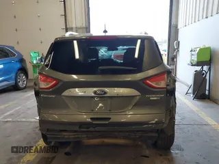 2016 Ford Escape Titanium with VIN 1FMCU9J92GUB63525, listed as a IAAI auction lot 41469824 with 156,773 mi miles. Bid and sale history available at carsss.com. Image 16.