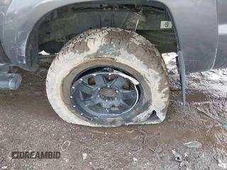 2014 Toyota Tacoma with VIN 3TMLU4EN0EM148389, listed as a IAAI auction lot 41490721 with 119,731 mi miles. Bid and sale history available at carsss.com. Image 6.