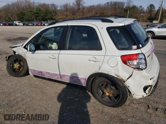 2012 Suzuki SX4 Crossover with VIN JS2YB5A32C6303887, listed as a Copart auction lot 82214144 with 0 mi miles and Salvage Title. Bid and sale history available at carsss.com. Image 2.
