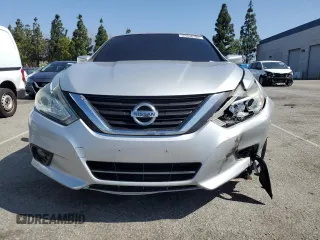 2017 Nissan Altima SL with VIN 1N4AL3APXHC232386, listed as a Copart auction lot 57254795 with 165,177 mi miles and Salvage title. Bid and sale history available at DreamBid. Image 5.
