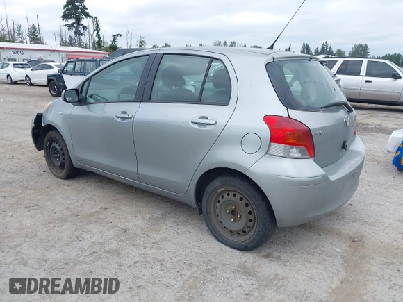 2010 Toyota Yaris z VIN JTDKT4K36A5290179, wystawiony jako IAAI lot #42515432 z przebiegiem 101 224 mil mil oraz . Historia ofert i sprzedaży dostępna na DreamBid. Obrazek 3.