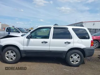 2006 Ford Escape XLT with VIN 1FMCU93106KA36063, listed as a IAAI auction lot 42610043 with 193,703 mi miles and . Bid and sale history available at DreamBid. Image 14.