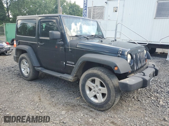 2012 Jeep Wrangler Sport with VIN 1C4AJWAG6CL256792, listed as a Copart auction lot 62634515 with 137,507 mi miles and Salvage title. Bid and sale history available at DreamBid. Image 4.