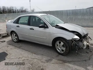 2004 Ford Focus SE with VIN 1FAFP34344W113759, listed as a Copart auction lot 51386335 with 148,267 mi miles and Salvage title. Bid and sale history available at DreamBid. Image 4.