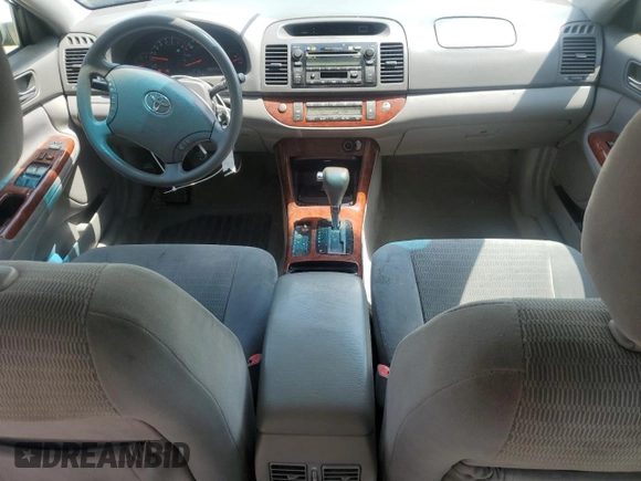 2005 Toyota Camry STD с VIN 4T1BE32K45U041477, выставлен на аукционе Copart как лот 57129635 с пробегом 216 497 миль миль и Списание • Salvage title. История ставок и продаж доступна на DreamBid. Изображение 8.