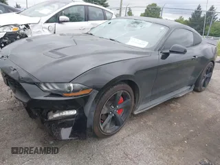 2021 Ford Mustang EcoBoost z VIN 1FA6P8TH7M5132841, wystawiony jako IAAI lot #42364830 z przebiegiem 22 331 mil mil oraz . Historia ofert i sprzedaży dostępna na DreamBid. Obrazek 2.