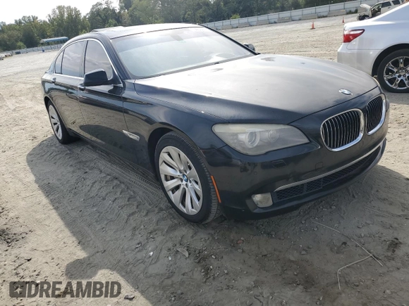 2011 BMW 7 Series with VIN WBAKX8C52BC198377, listed as a Copart auction lot 70003444 with 173,725 mi miles and Salvage title. Bid and sale history available at DreamBid. Image 4.