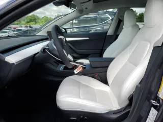 2023 Tesla Model 3 z VIN 5YJ3E1EA0PF677471, wystawiony jako Copart lot #57661625 z przebiegiem 20 326 mil mil oraz Szkoda całkowita • Salvage title. Historia ofert i sprzedaży dostępna na DreamBid. Obrazek 7.