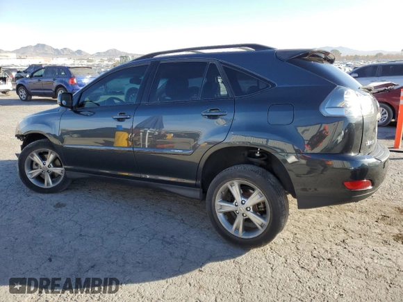 2007 Lexus RX 400h z VIN JTJGW31U172005381, wystawiony jako Copart lot #85118324 z przebiegiem 145 757 mil mil oraz Szkody całkowita. Historia ofert i sprzedaży dostępna na DreamBid. Obrazek 2.