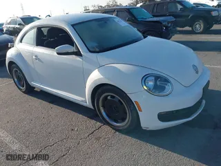 2012 Volkswagen Beetle 2.5L PZEV with VIN 3VWJP7AT3CM664552, listed as a IAAI auction lot 42077635 with 96,195 mi miles. Bid and sale history available at carsss.com. Image 1.