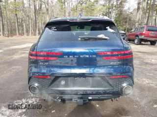 2022 Genesis GV70 Sport z VIN KMUMCDTC3NU074029, wystawiony jako IAAI lot #41400987 z przebiegiem 29 494 mil mil oraz . Historia ofert i sprzedaży dostępna na DreamBid. Obrazek 16.