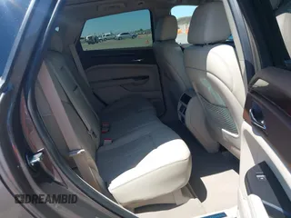 2015 Cadillac SRX Performance Collection with VIN 3GYFNFE35FS569682, listed as a IAAI auction lot 42322229 with 124,365 mi miles and . Bid and sale history available at DreamBid. Image 8.