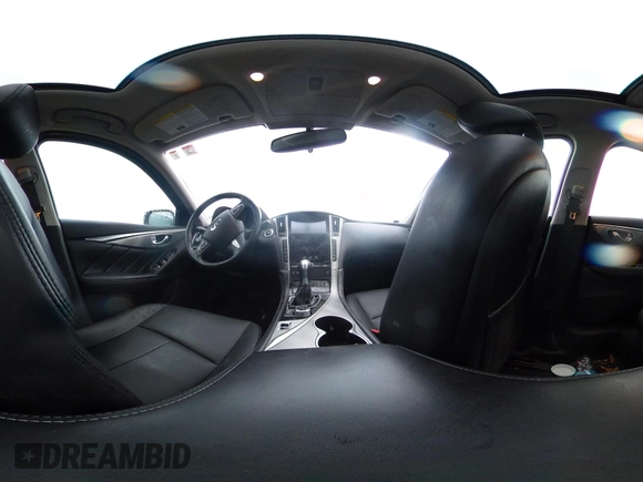 2015 Infiniti Q50 Premium z VIN JN1BV7ARXFM412382, wystawiony jako IAAI lot #40776813 z przebiegiem 66 406 mil mil oraz . Historia ofert i sprzedaży dostępna na DreamBid. Obrazek 18.