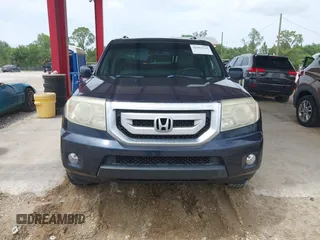 2011 Honda Pilot Touring z VIN 5FNYF3H94BB032105, wystawiony jako IAAI lot #42435522 z przebiegiem 247 899 mil mil oraz . Historia ofert i sprzedaży dostępna na DreamBid. Obrazek 12.